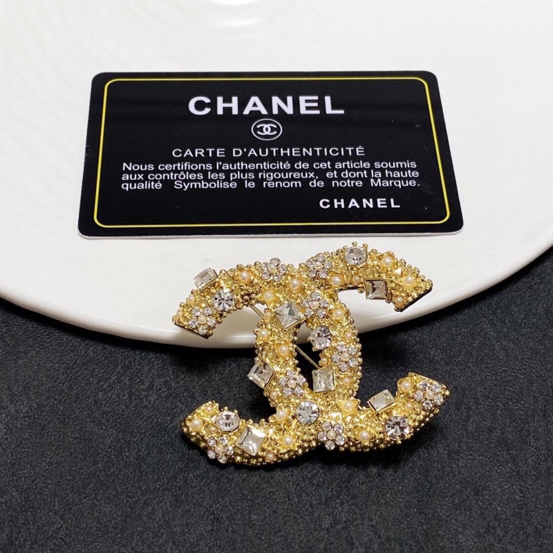 Ch**el brooches